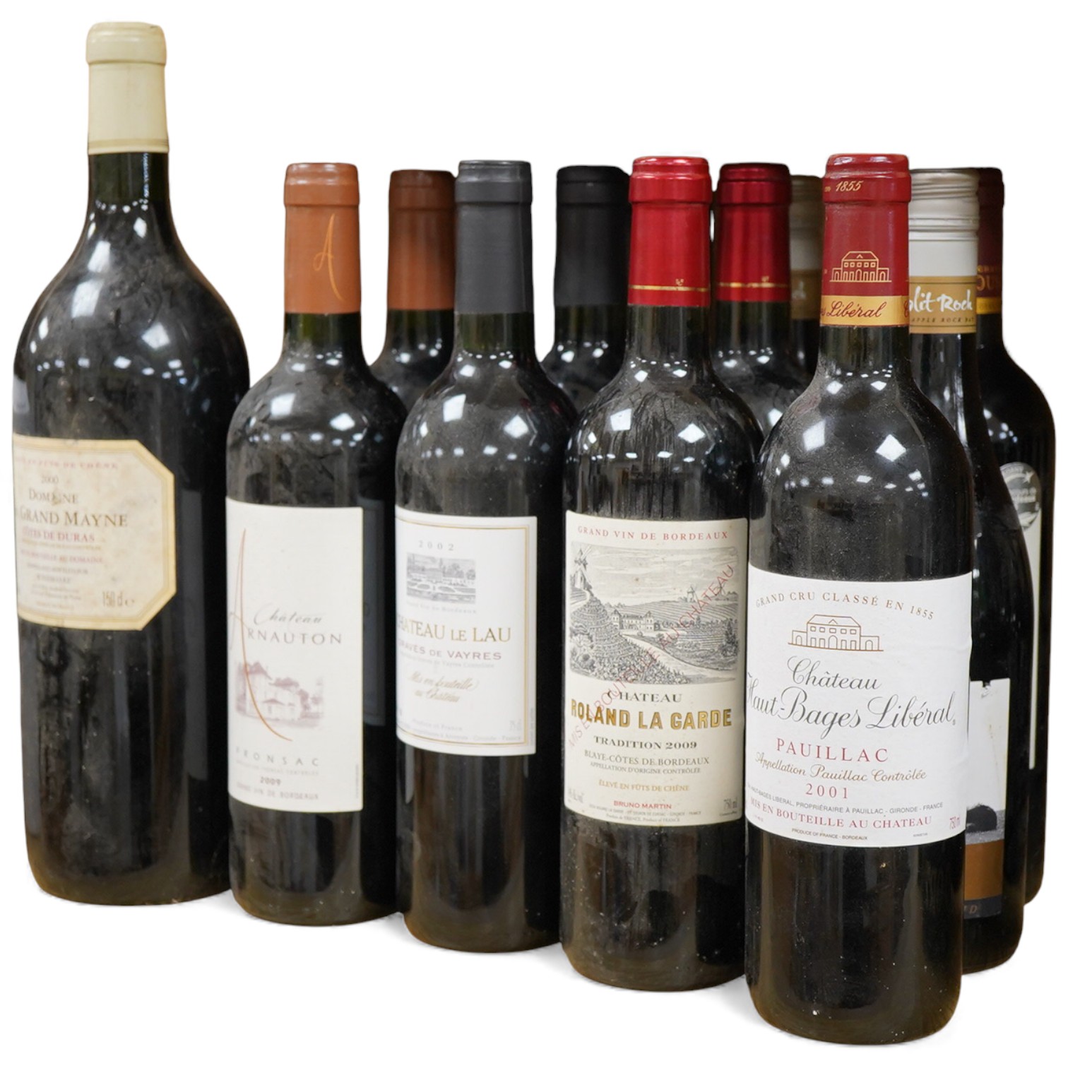 A bottle of Chateau Haut-Bages Liberal, 2001, and thirteen other bottles of red wine